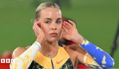 Keely Hodgkinson poses on a throne after breaking the world indoor 800m record