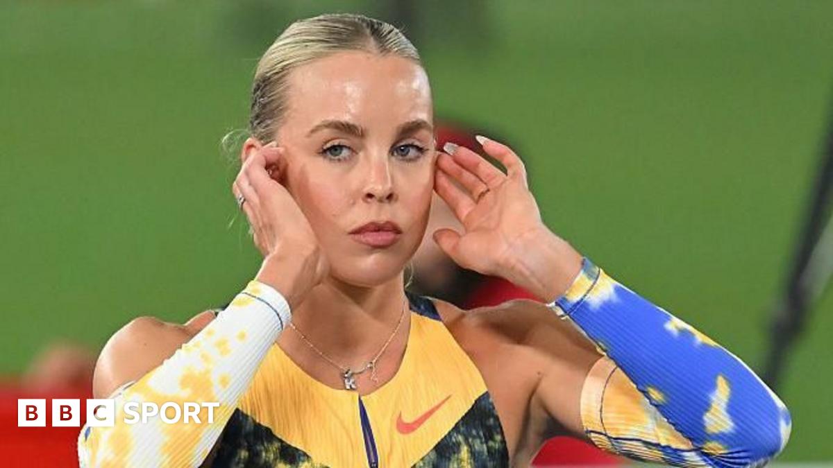 Keely Hodgkinson poses on a throne after breaking the world indoor 800m record
