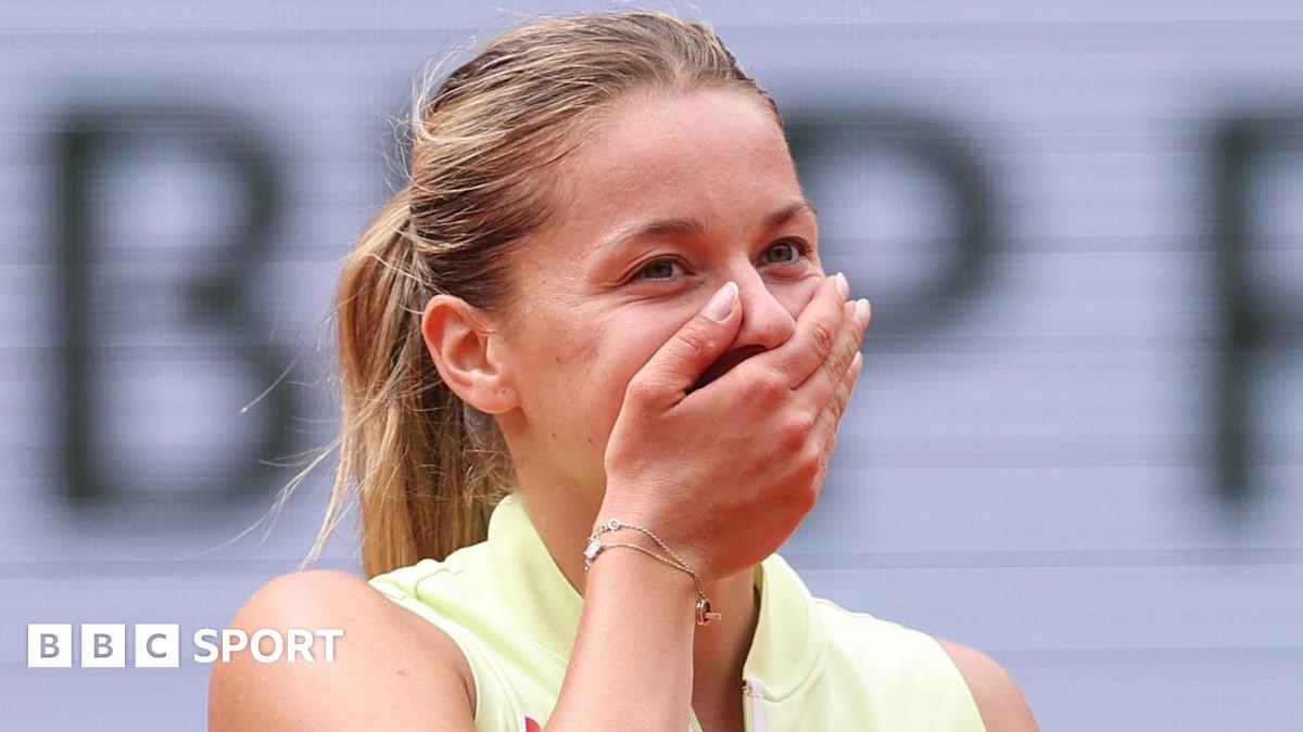 Polish qualifier Maja Chwalinska covers her mouth with her hand after completing victory over Anna Kalinskaya
