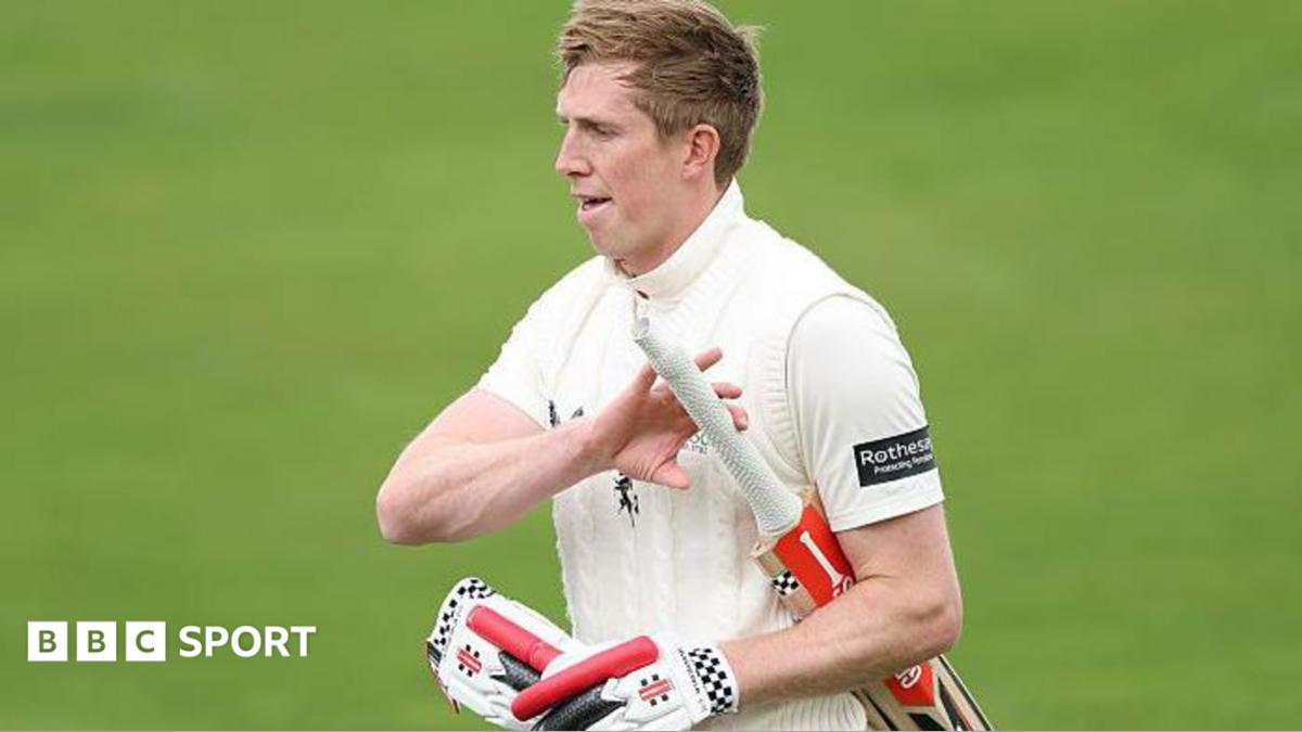 Zak Crawley walks back dejectedly after being dismissed in county cricket