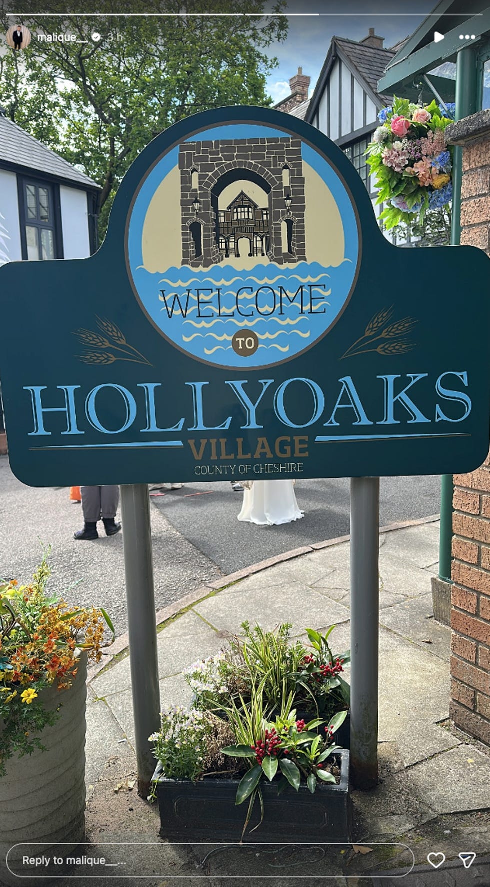 sign welcoming visitors to hollyoaks village in cheshire