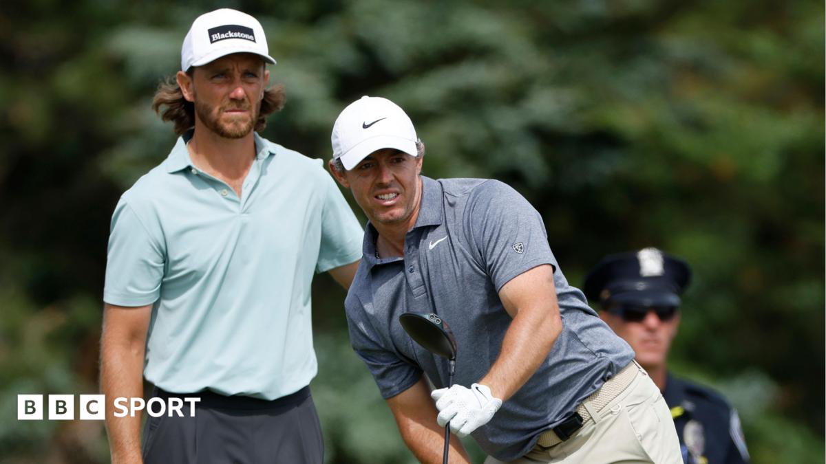 Tommy Fleetwood and Rory McIlroy pictured together during the second round of the US Open at Shinnecock Hills