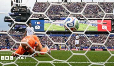 Iraq goalkeeper Ahmed Basil looks on as France forward Kylian Mbappe's shot hits the net in the World Cup group game in Philadelphia on 22 June, 2026