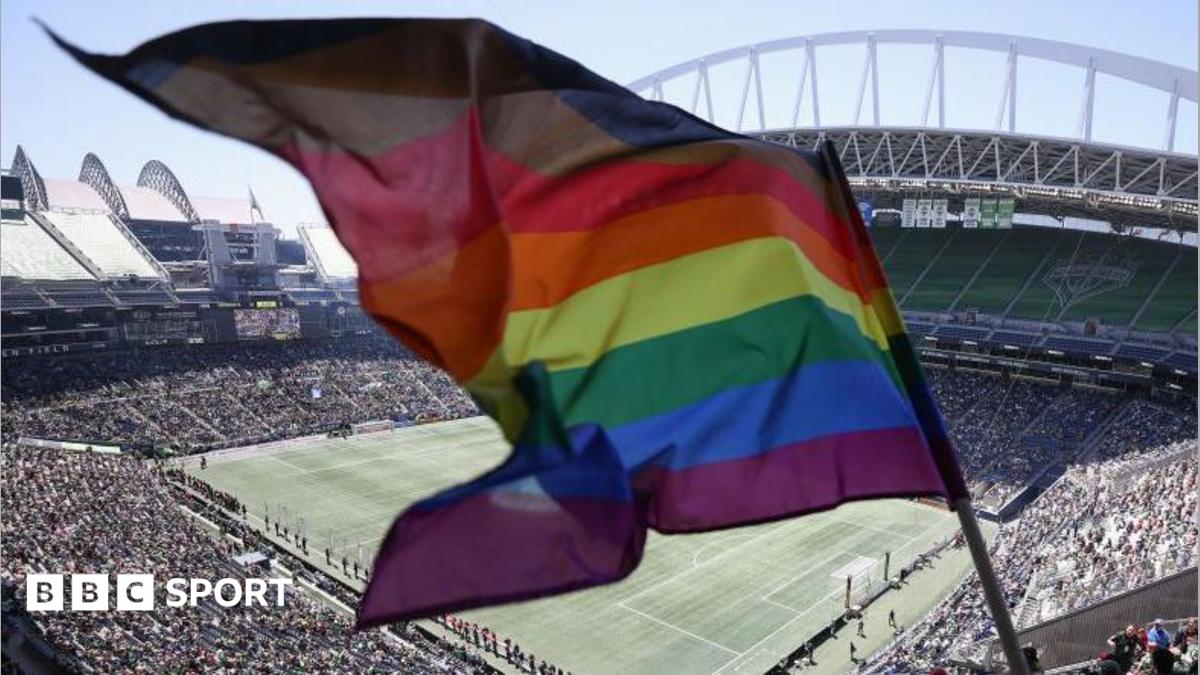 A rainbow flag being flown at the Seattle Stadium.