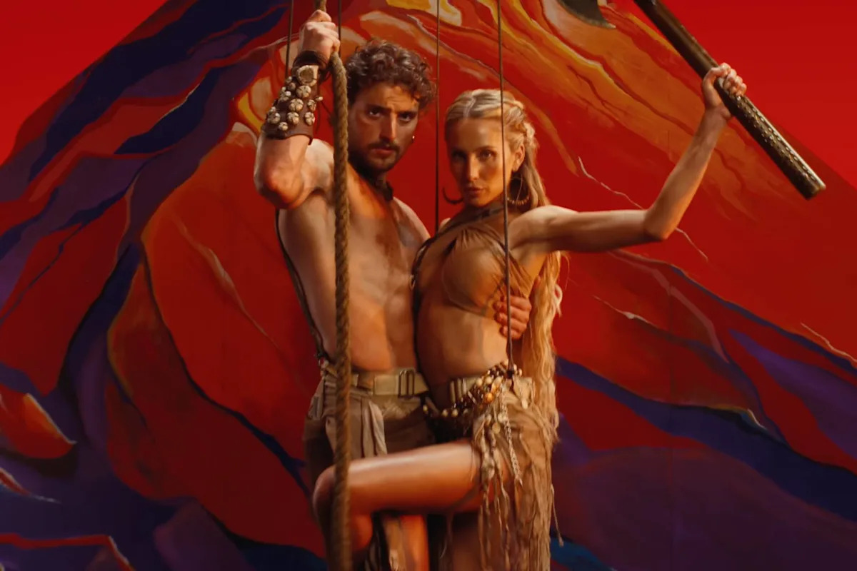 Benson Boone and Alix Earle Fight Dragons, Lock Lips in ‘The Time of My Life’ Video