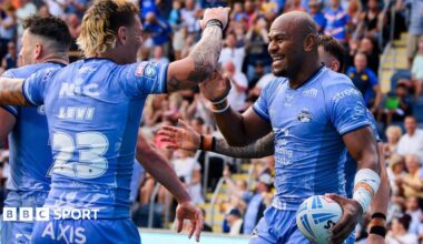 Leeds' Maika Sivo (right) celebrates scoring a try against Hull KR.