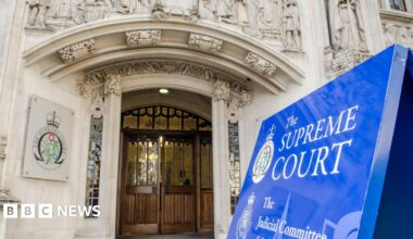 Exterior signage and entrance to the Supreme Court.