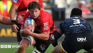 Cullen Grace carries the ball into a tackle