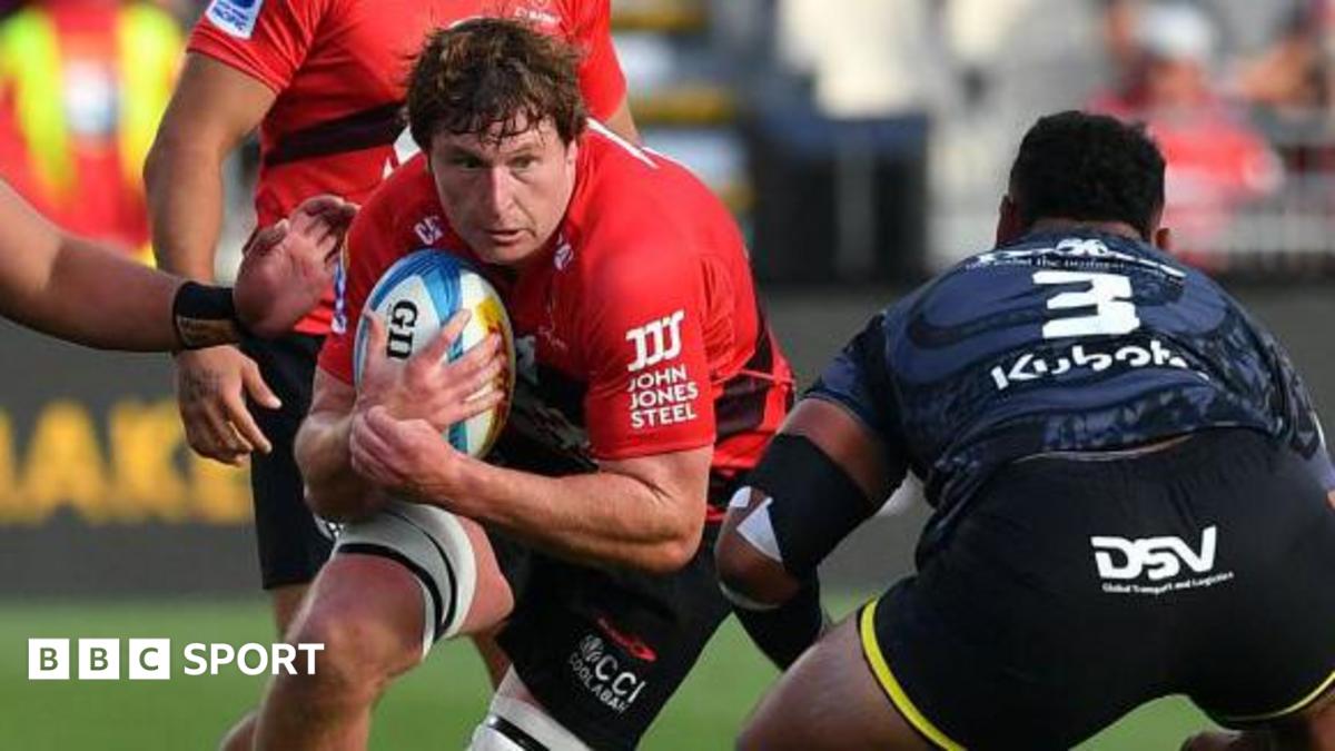 Cullen Grace carries the ball into a tackle
