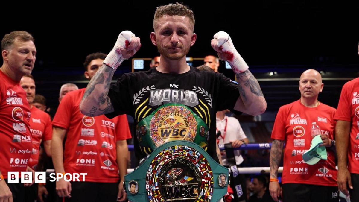 Ryan Garner and Wayne Batten pose for a photo in the ring at St Mary's Stadium