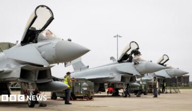 Three RAF Typhoon aircraft, with their canopies open, prepare to depart RAF Coningsby for Qatar