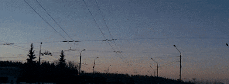 A gif of a bright streak moving across the sky and growing brighter towards the end of its journey