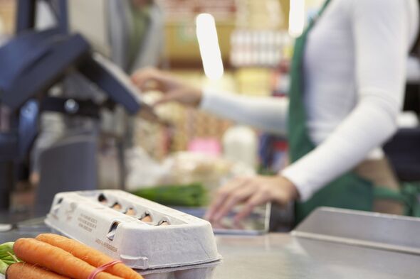 Groceries on check out counter Groceries on check out counter