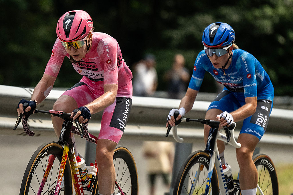 SD Worx Dutch rider Anna Van Der Breggen wearing the overall leader's pink jersey (Maglia Rosa) and FDJ SUEZ Dutch rider Demi Vollering wearing the best climber's blue jersey (Maglia Azzura) ride during the 9th stage of the Giro d'Italia Women 2026 - Tour of Italy Women cycling race between Saluzzo and Saluzzo, Italy, on June 7, 2026. (Photo by MARCO BERTORELLO / AFP)