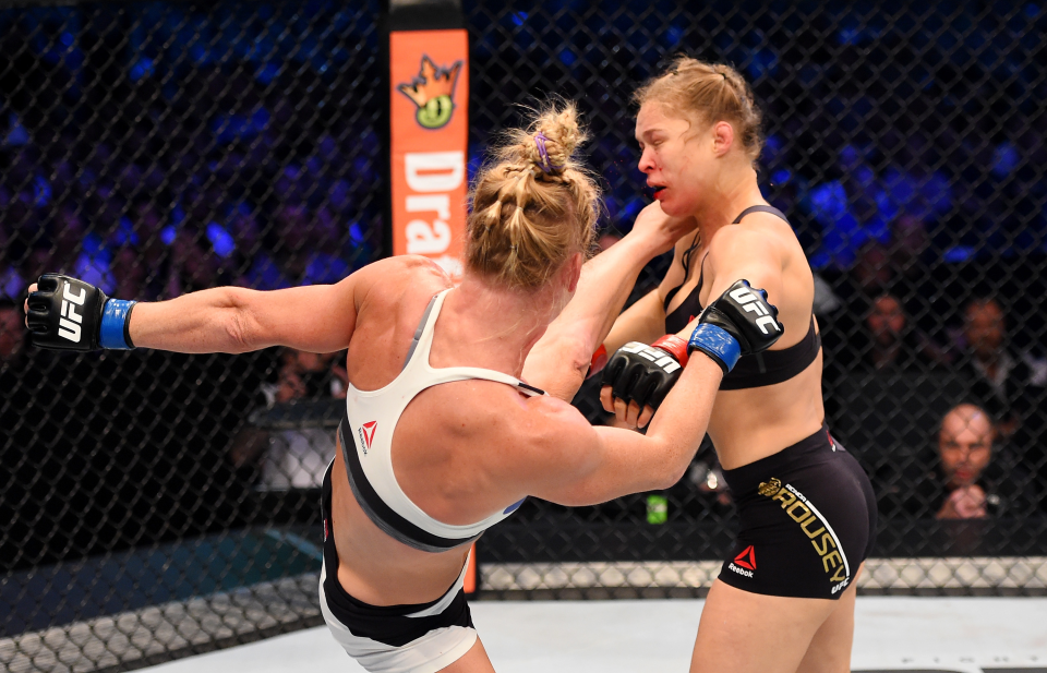 Holly Holm lands a left-high kick against Ronda Rousey in the second round of their UFC women's bantamweight championship bout during the UFC 193 event at Etihad Stadium on November 15, 2015 in Melbourne, Australia