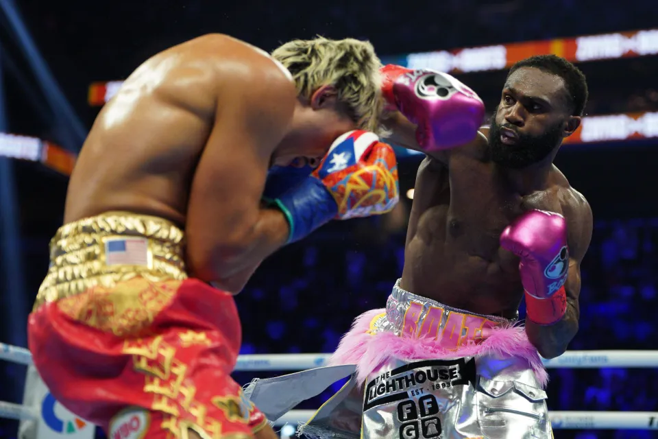 Jaron 'Boots' Ennis (R) throws a punch at Xander Zayas (L) during their WBO and WBA World Super-Welterweight title bout at Barclays Center on June 27, 2026 in New York City