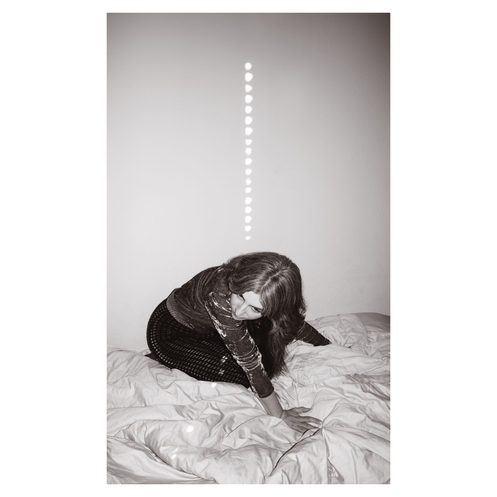 Image may contain Julia Holter Photography Adult Person Face Head Portrait Bed Furniture Bedroom Indoors and Room