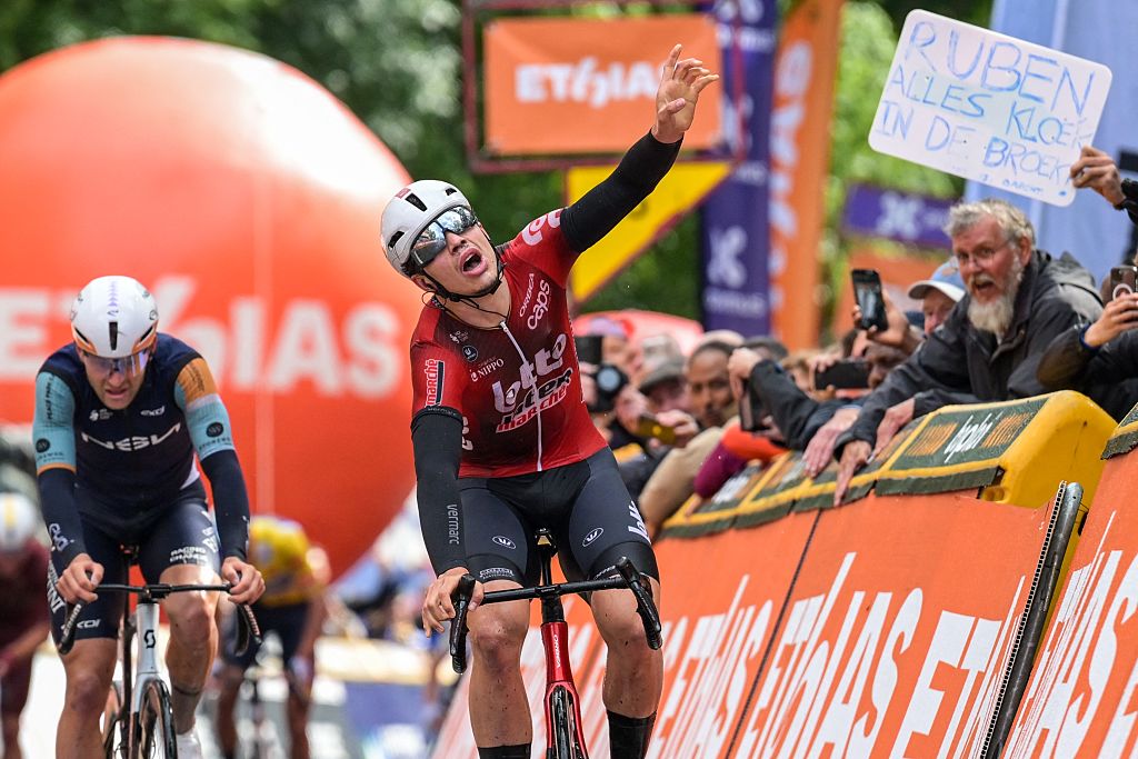Belgian Arnaud De Lie of Lotto-Intermarche celebrates as he crosses the finish line to win the fourth stage of the Tour De Wallonie cycling race, from Dison to Eupen (166,7 km), on Thursday 04 June 2026. BELGA PHOTO DAVID PINTENS (Photo by DAVID PINTENS / BELGA MAG / Belga via AFP)