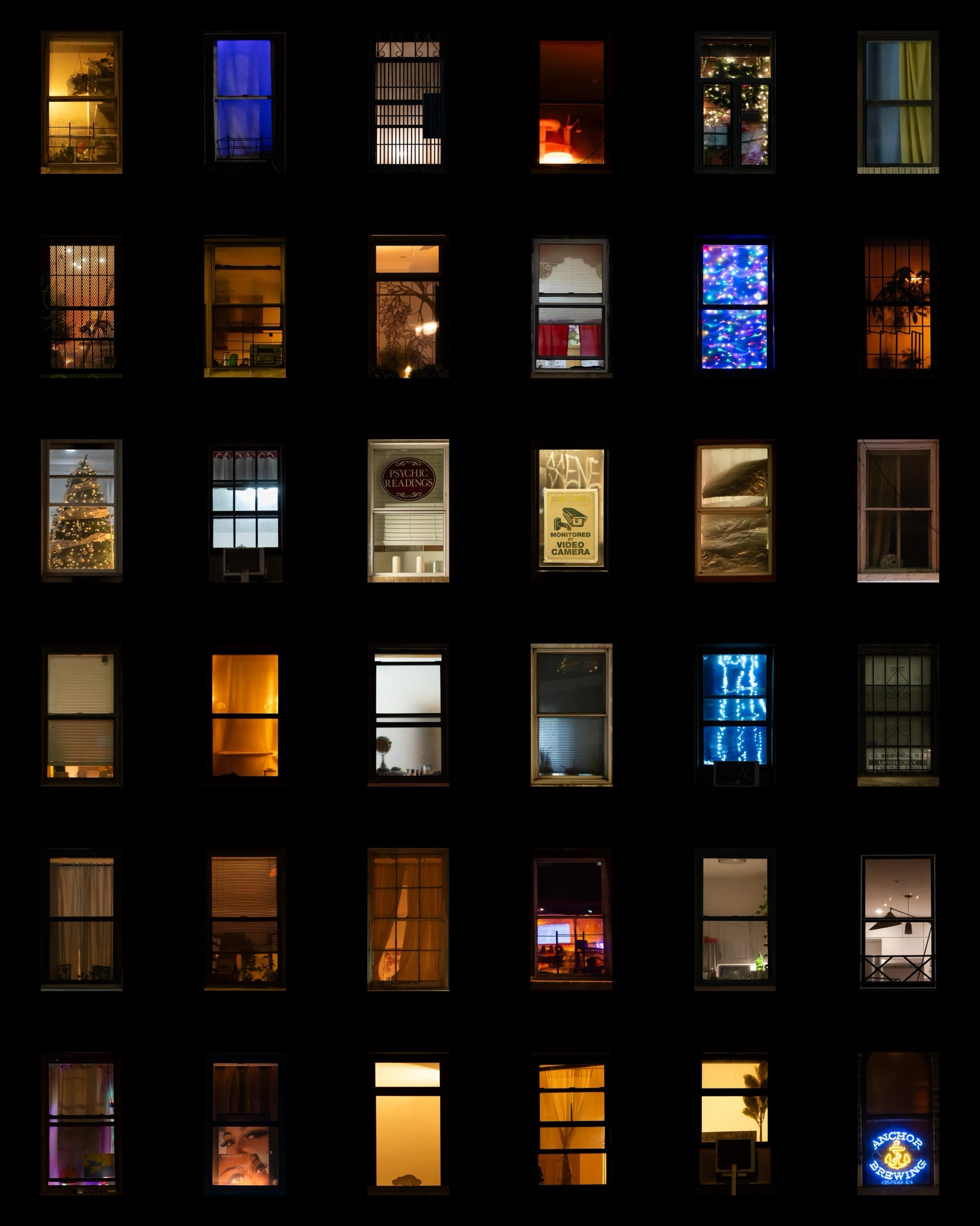 a composite grid of nighttime photographs of windows in New York City