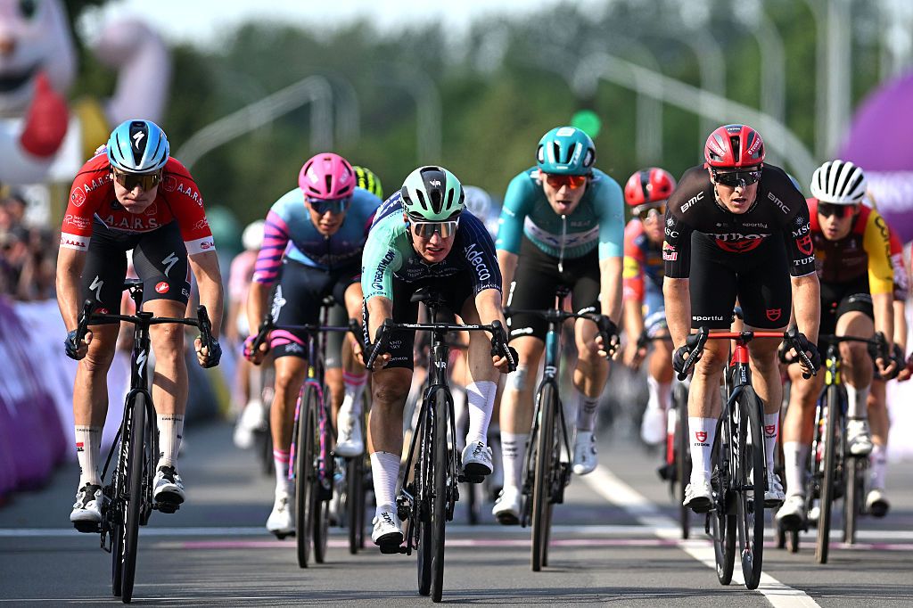 AARSCHOT, BELGIUM - JUNE 20: (L-R) Tim Merlier of Belgium and Team Soudal Quick-Step - Red Points Jersey, stage winner Olav Kooij of Netherlands and Team Decathlon CMA CGM and Petr Kelemen of Czech Republic and Team Tudor Pro Cycling sprint at finish line during the 95th Baloise Belgium Tour 2026, Stage 4 a 183.4km stage from Begijnendijk-Betekom to Aarschot on June 20, 2026 in Aarschot, Belgium. (Photo by Luc Claessen/Getty Images)