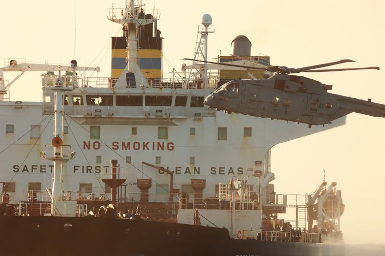UK Ministry of Defence handout photos show military forces intercepting an oil tanker linked to Russia’s shadow fleet in the English Channel.