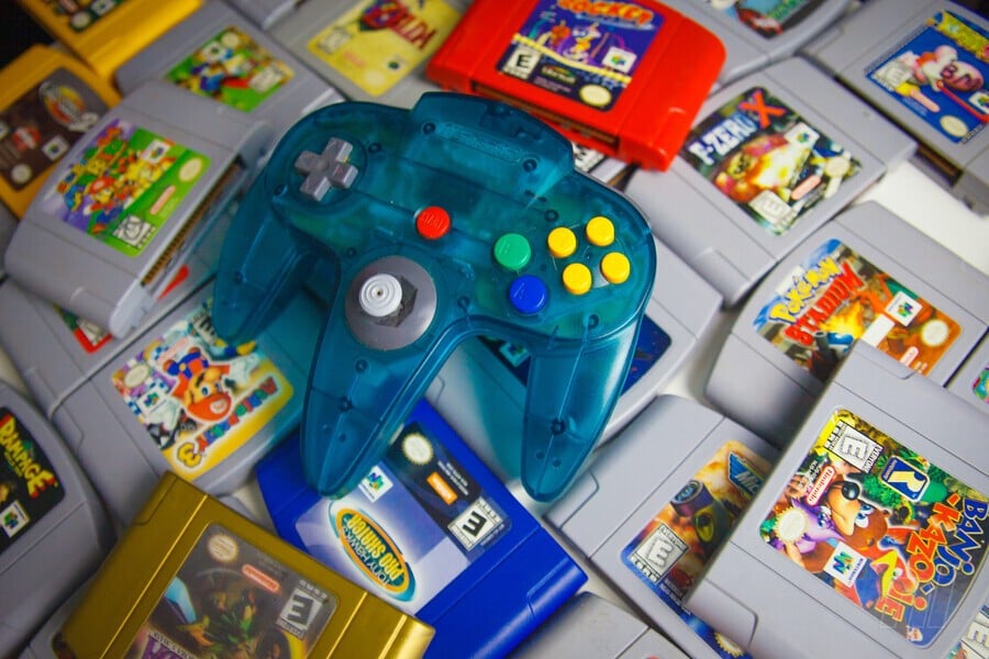 N64 game pile plus controller