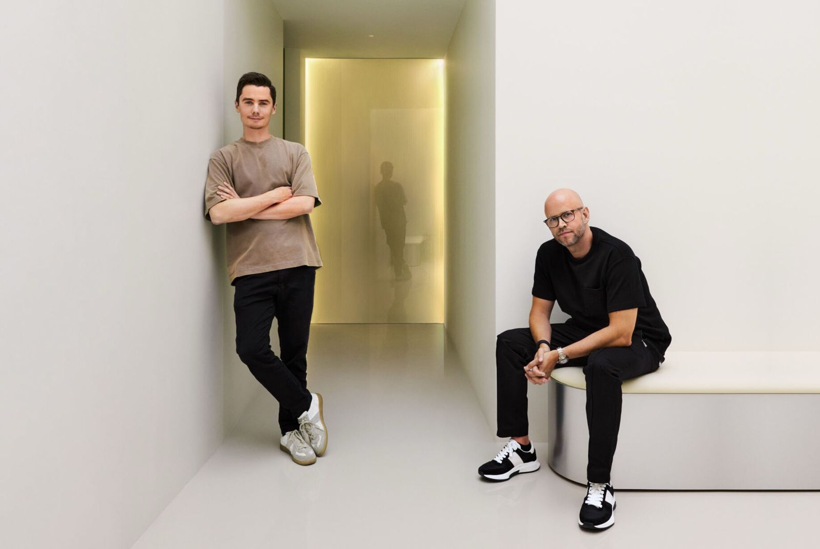 Image may contain Daniel Ek Clothing Footwear Shoe Sneaker Adult Person Sitting Pants Face Head and Wristwatch