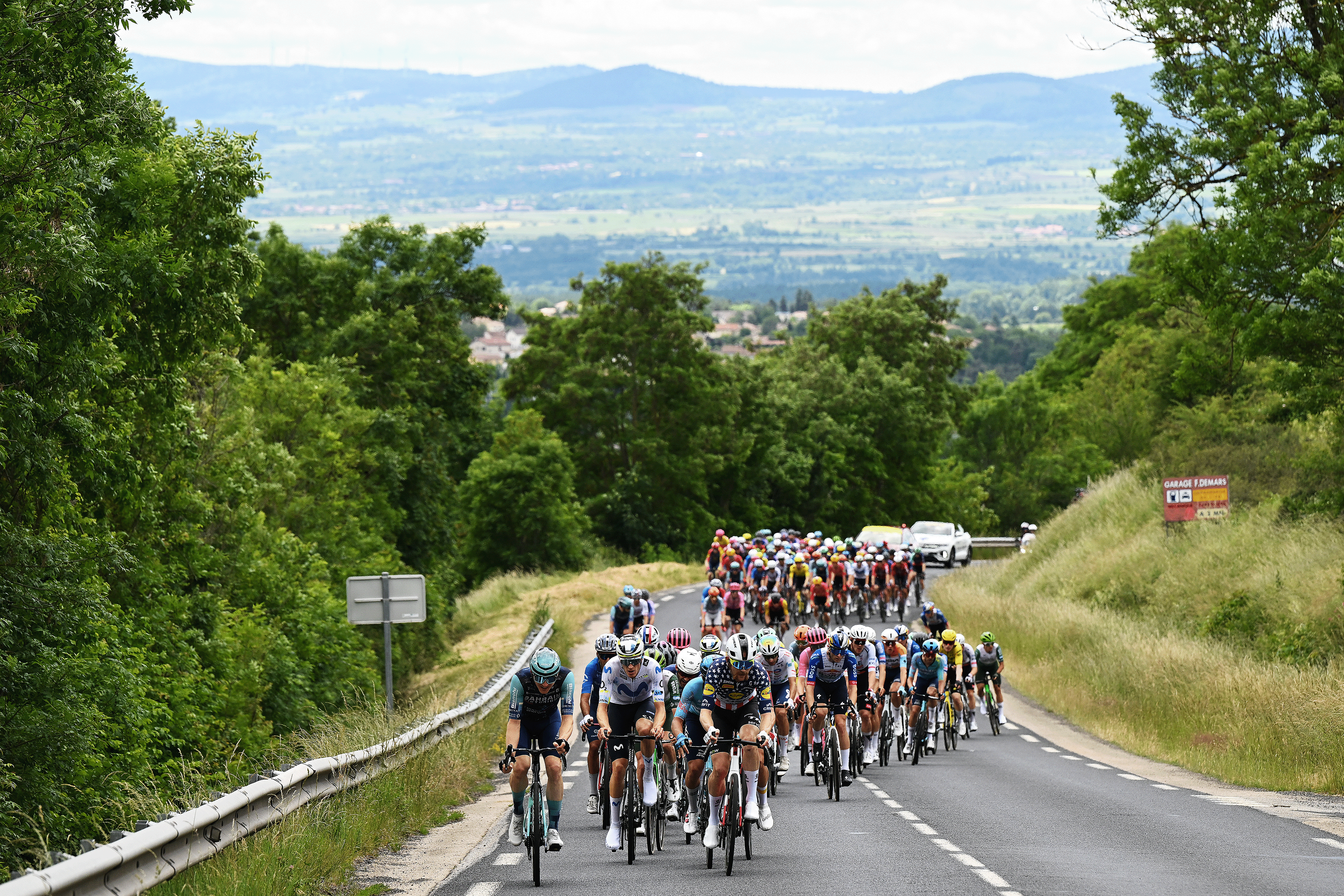 MONTROND-LES-BAINS, FRANCE - JUNE 10: Pablo Castrillo of Spain and Team Movistar, Quinn Simmons of United States and Team Lidl - Trek and Simone Velasco of Italy and Team XDS Astana lead the peloton during the 78th Tour Auvergne-Rhone-Alpes 2026, Stage 4 a 167.4km stage from Le Puy-en-Velay to Montrond-les-Bains / #UCIWT / on June 10, 2026 in Montrond-les-Bains, France. (Photo by Dario Belingheri/Getty Images)