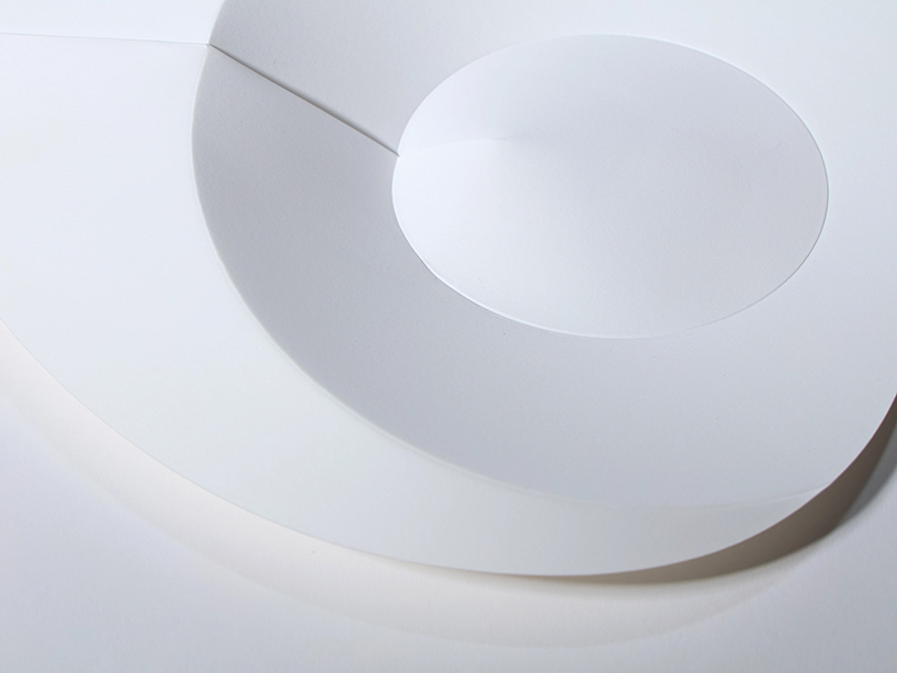 a ribless circular folded sculpture reimagines the traditional japanese paper fan - 3