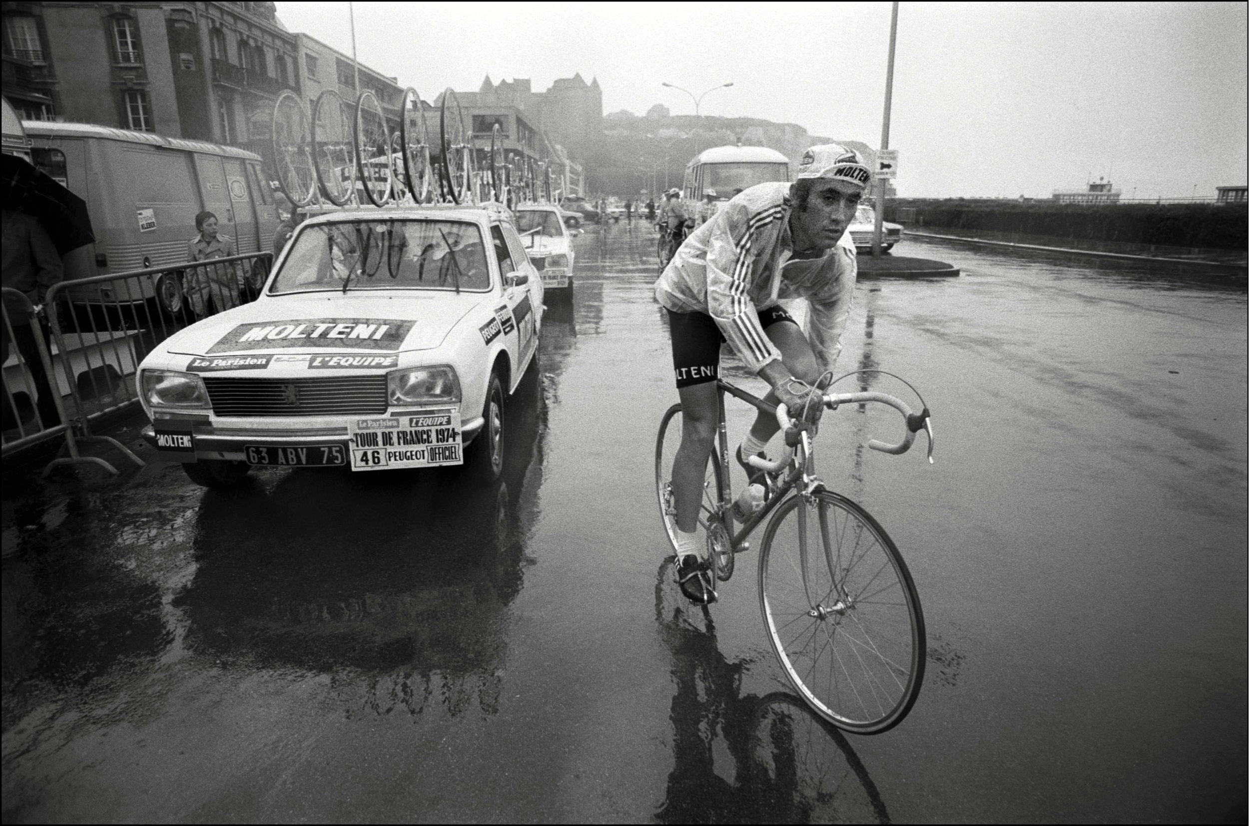 Eddy Merckx rides through rain during Tour de France