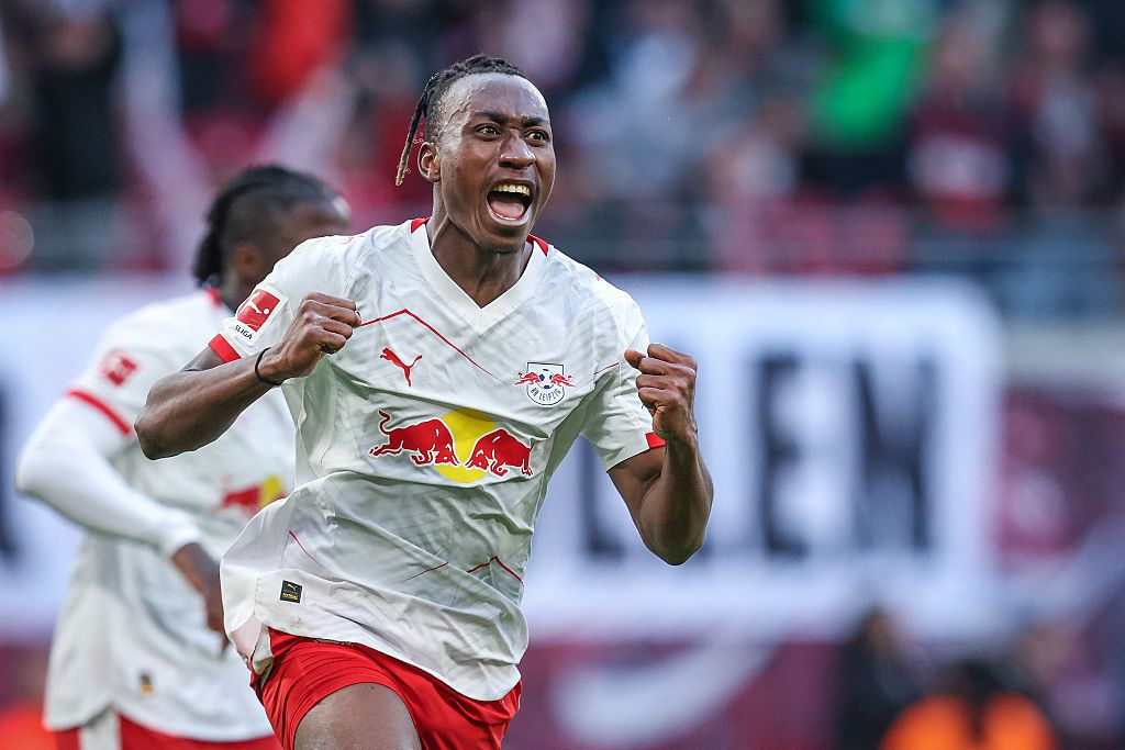 Leipzig's Ivorian forward #49 Yan Diomande celebrates after scoring the 1-1 goal during the Bundesliga football match between RB Leipzig and Augsburg in Leipzig, eastern Germany, on March 7, 2026.