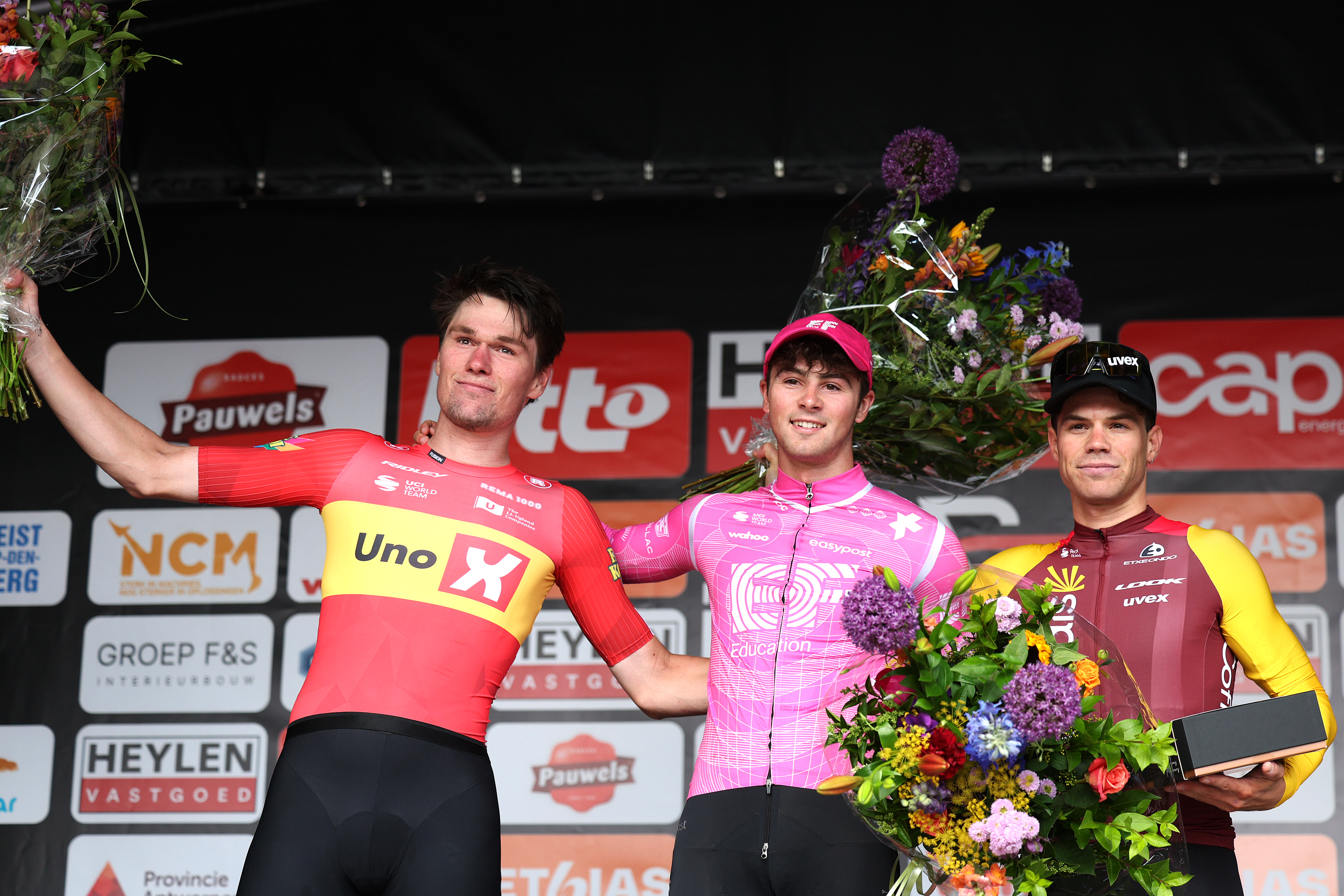 HEIST-OP-DEN-BERG, BELGIUM - JUNE 06: (L-R) Soren Waerenskjold of Norway and Team Uno-X Mobility on second place, race winner Alfred Bruce Noah Hobbs of Great Britain and Team EF Education - EasyPost and Milan Fretin of Belgium and Team Cofidis on third place pose on the podium ceremony after the 68th Heylen Vastgoed Heistse Pijl 2026 a 187.5km one day race from Vosselaar to Heist-op-den-Berg on June 06, 2026 in Heist-op-den-Berg, Belgium. (Photo by Rhode Van Elsen/Getty Images)
