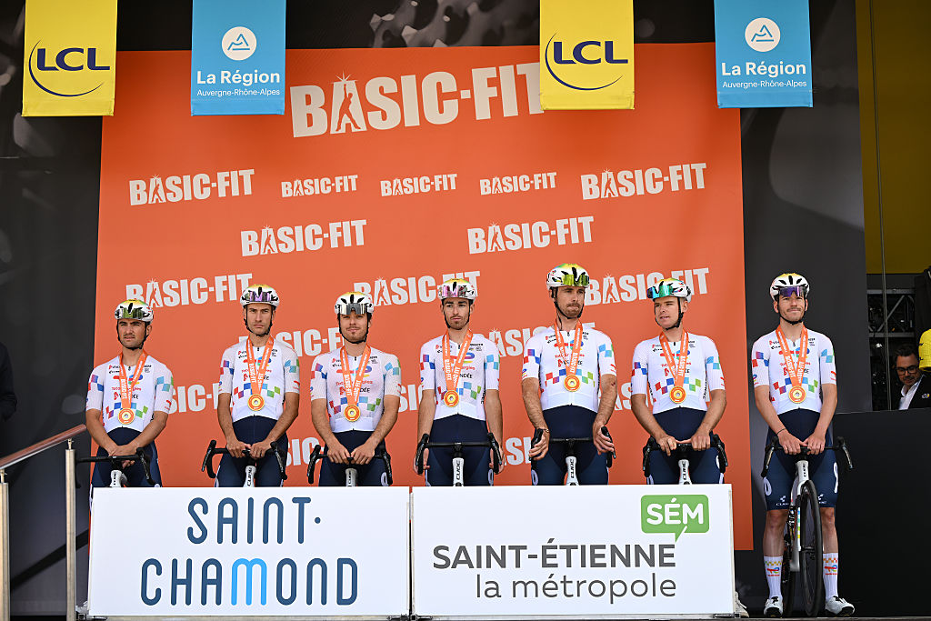 SAINT-CHAMOND, FRANCE - JUNE 11: Jordan Jegat of France, Geoffrey Bouchard of France, Nicolas Breuillard of France, Mathieu Burgaudeau of France, Thibault Guernalec of France, Mathis Le Berre of France, Matteo Vercher of France and Team TotalEnergies prior to the 78th Tour Auvergne-Rhone-Alpes 2026, Stage 5 a 195.8km stage from Saint-Chamond to Parc des Oiseaux Villars-les-Dombes / #UCIWT / on June 11, 2026 in Saint-Chamond, France. (Photo by Dario Belingheri/Getty Images)