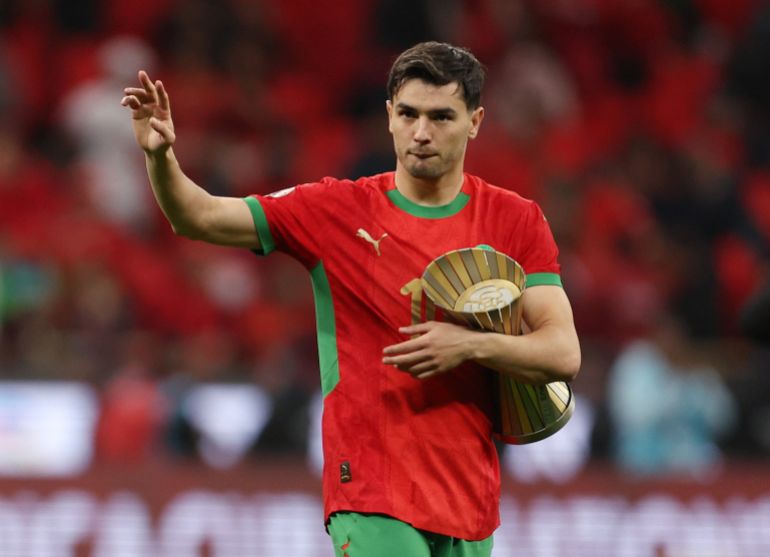 Soccer Football - CAF Africa Cup of Nations - Morocco 2025 - Round of 16 - Morocco v Tanzania - Prince Moulay Abdellah Stadium, Rabat, Morocco - January 4, 2026 Morocco's Brahim Diaz celebrates with the man of the match trophy after the match REUTERS/Amr Abdallah Dalsh