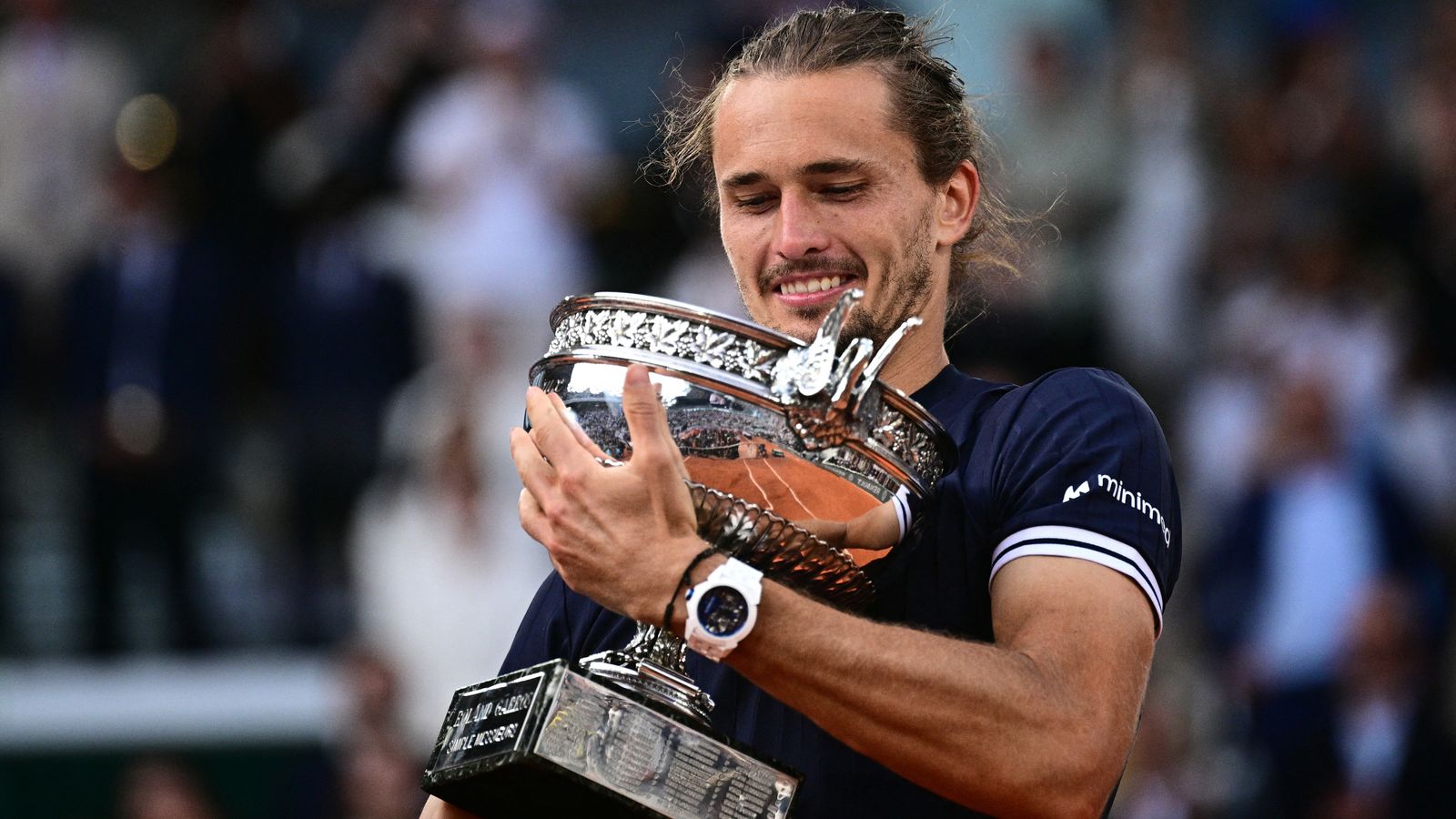 Germany's Alexander Zverev holds "La Coupe des Mousquetaires" trophy after winning the French Open tennis tournament men's singles final mat