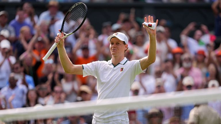 Jannik Sinner of Italy celebrates winning the men's singles match against Miomir Kecmanovic of Serbia during at the Wimbledon Tennis Champio