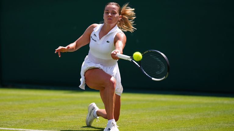 Maja Chwalinska of Poland returns the ball during the women's singles match at the Wimbledon Tennis Championships in London, Monday, June 29