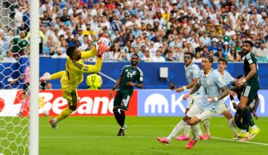 Saudi Arabia goalkeeper Mohammed Al-Owais makes a save during the World Cup Group H soccer match against Uruguay