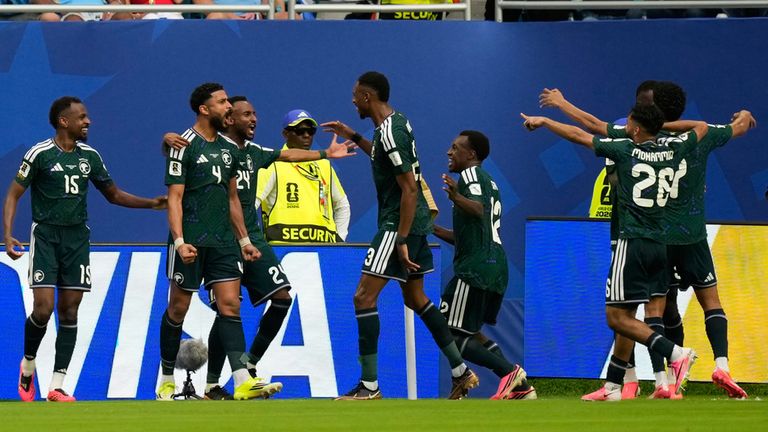 Saudi Arabia's Abdulelah Alamricelebrates scoring his side's opener