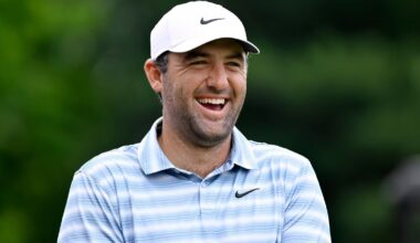Scottie Scheffler smiles as he is introduced at the first hits hole during the second round of the Travelers Championship golf tournament at TPC River Highlands, Friday, June 26, 2026, in Cromwell, Conn. (AP Photo/Jessica Hill)