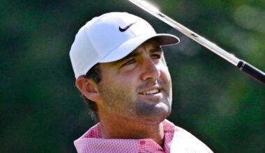 Scottie Scheffler holds a one-shot lead at the Travelers Championship through 13 holes, after bad weather stops play