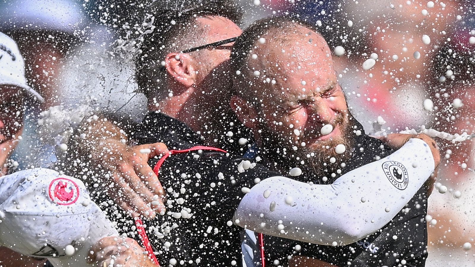Tyrrell Hatton is drenched with champagne after winning in Andalucia