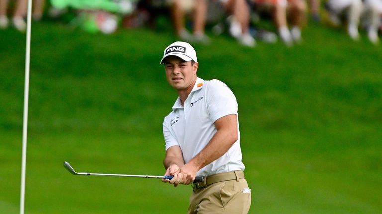 Viktor Hovland, of Norway, holds a one-shot lead going into the final round. (AP Photo/Jessica Hill)