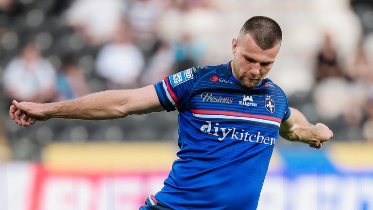 Wakefield's Max Jowitt kicks for goal.