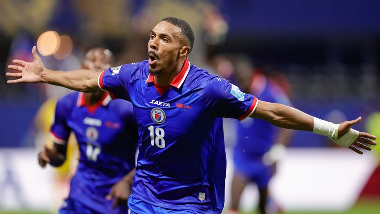 Haiti's Wilson Isidor celebrates scoring during the first half of the Group C match against Morocco (AP Photo/Stew Milne)