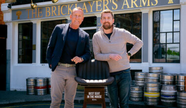 Footballer Ray Parlour stands with landlord of London pub The Bricklayer's Arms
