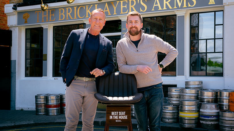 Footballer Ray Parlour stands with landlord of London pub The Bricklayer's Arms