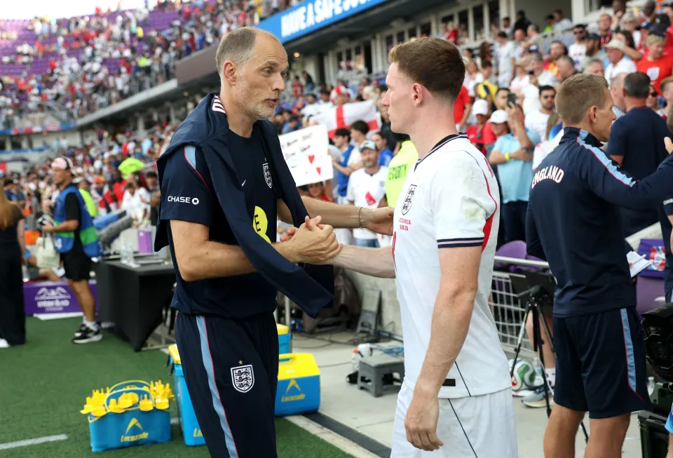  Thomas Tuchel, Manager of England, shakes hands with Elliot Anderson