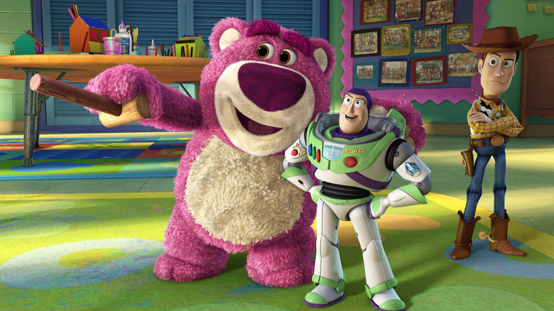 Lotso getting chummy with Buzz while Woody judges in 