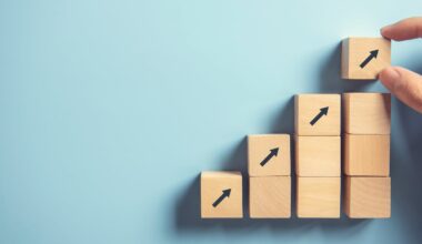 An ascending stack of wooden blocks with arrows pointing up.